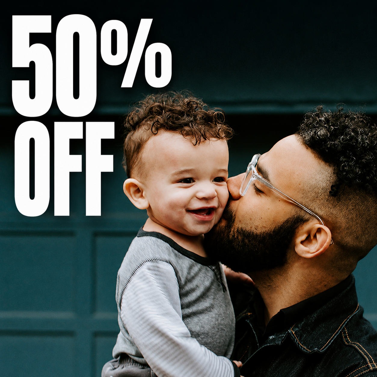 Father and child photo promoting 50% off every other personalised canvas print from The Canvas Printing Company